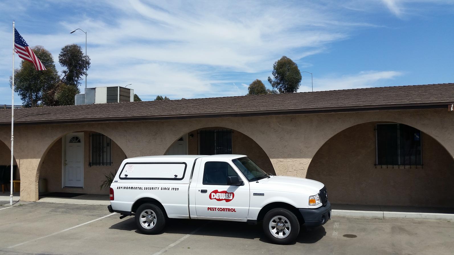 Dewey Pest and Termite Ford Truck in front of Office